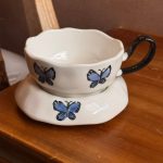 ⁦كوب فراشات ازرق 🦋⁩ - الصورة ⁦2⁩