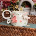 ⁦كوب فراشات زهري⁩ - الصورة ⁦2⁩